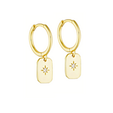 A pair of 14K gold plated hoop earrings with a round, star-cut white cubic zirconia stone.