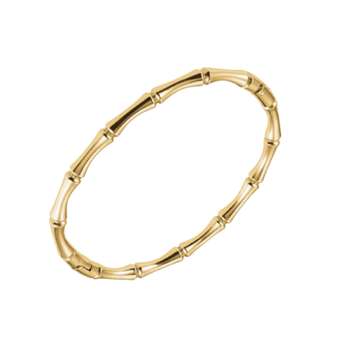 An 18k gold plated stainless steel bangle bracelet with a bamboo design.