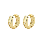 14K gold-plated Serena Hoops earrings on display