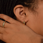 Close-up of Este Hoops 14K gold plated earrings without any diamonds