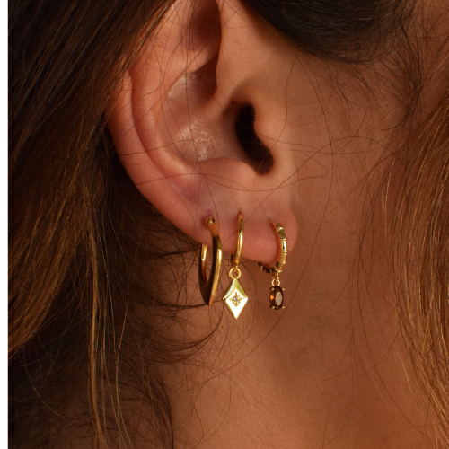 Close-up of 14K gold-plated diamond hoop earrings 
