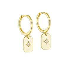 A pair of 14K gold plated hoop earrings with a round, star-cut white cubic zirconia stone.