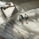 14K Gold Plated Ivory Pearl Earrings presented on a white surface