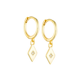Detail of the diamond embellishments on 14K gold-plated hoop earrings