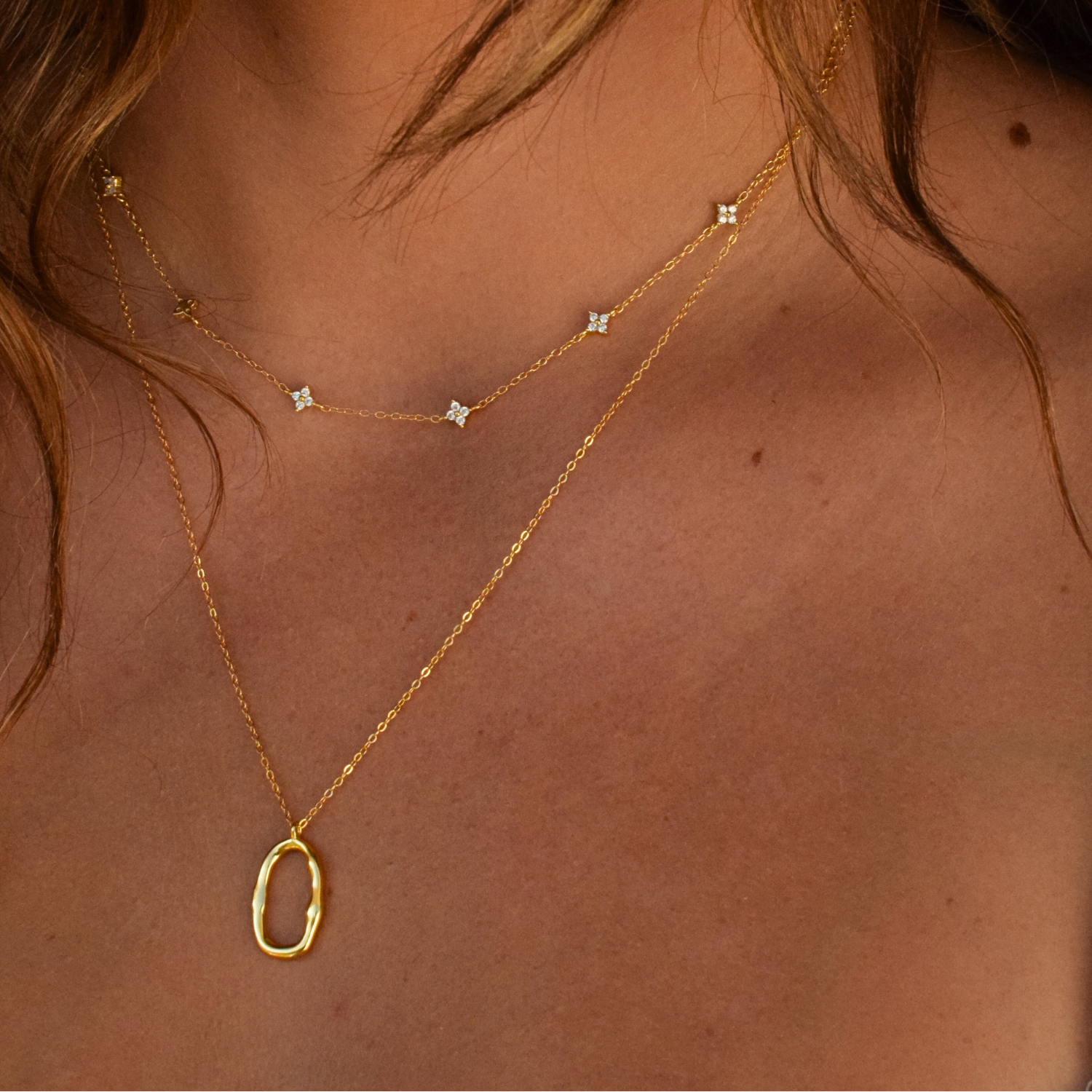 Elegant Astra Necklace with a delicate 14K gold-plated circle pendant