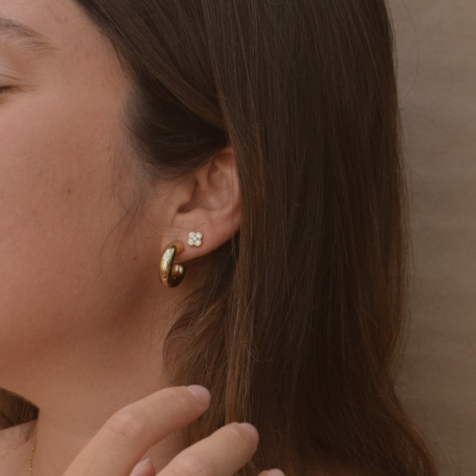 Side view of a woman wearing a 'Samantha Hoop' earring in 14K Gold Plated style