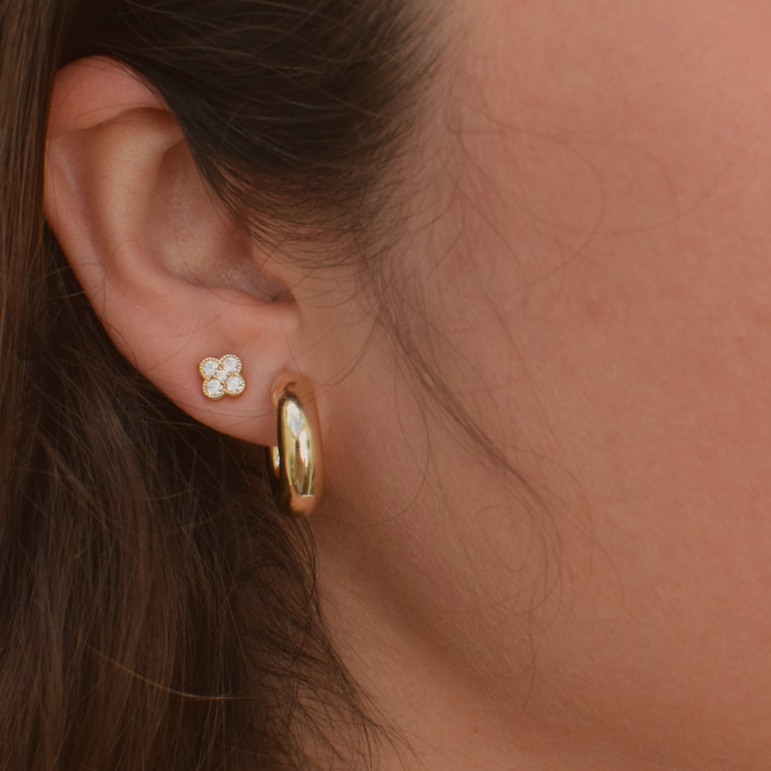 Elegant 14K gold plated earrings designed in a four-leaf clover shape