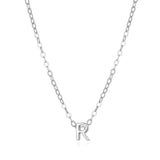 Petite initial R pendant on a sterling silver necklace